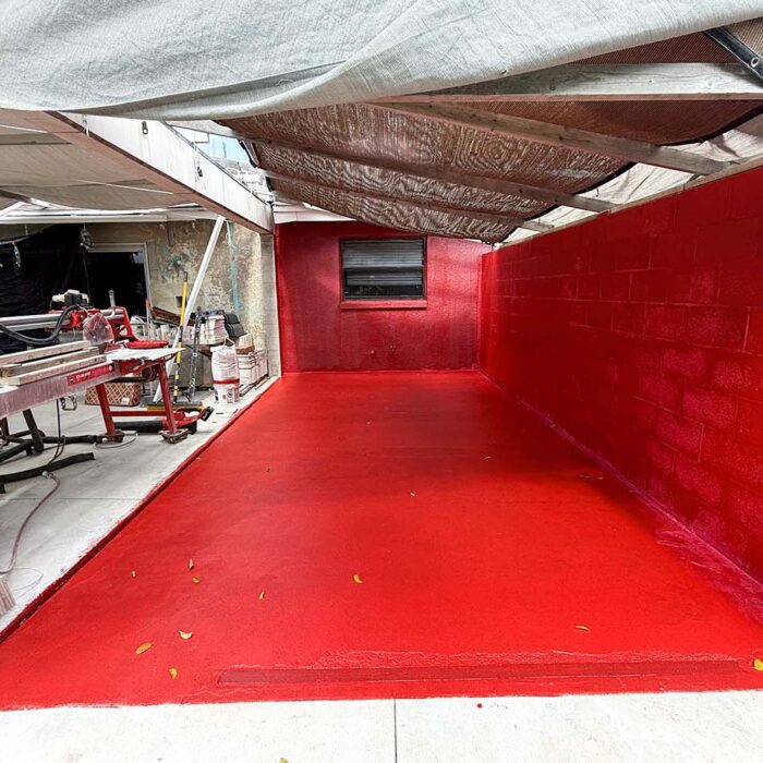 Overlay and block walls primed with waterproofing and ready for stone tile finish