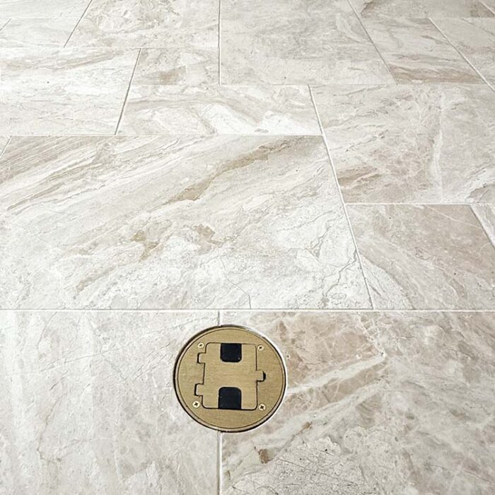 Concrete Cutting and Core Drilling to accommodate a new Floor Plug in an interior living room.