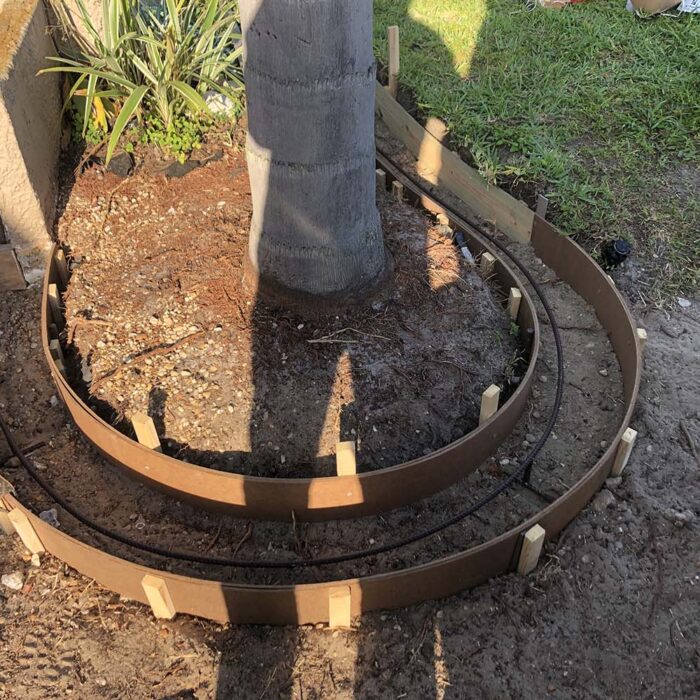 Curved concrete curb form with rebar 