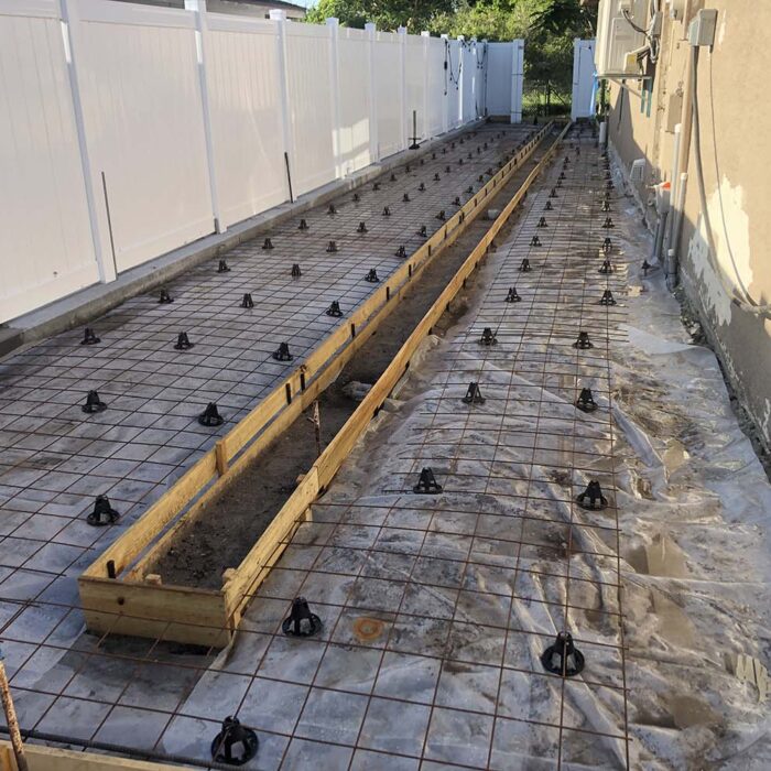 Concrete slab pour with trench drainage cut out
