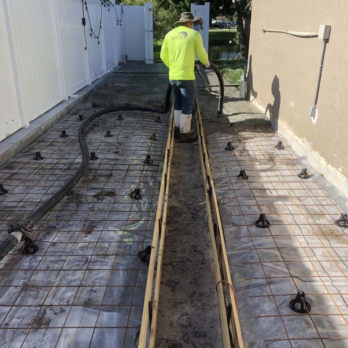 Concrete slab pour with trench drainage cut out