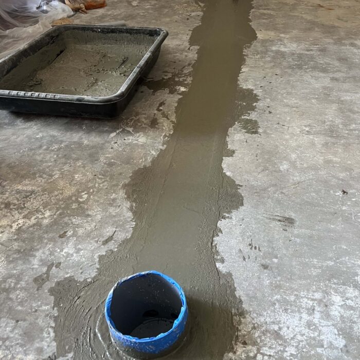 Concrete Cutting and Core Drilling to accommodate a new Floor Plug in an interior living room.