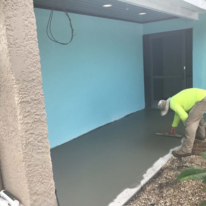 New concrete front porch expansion.