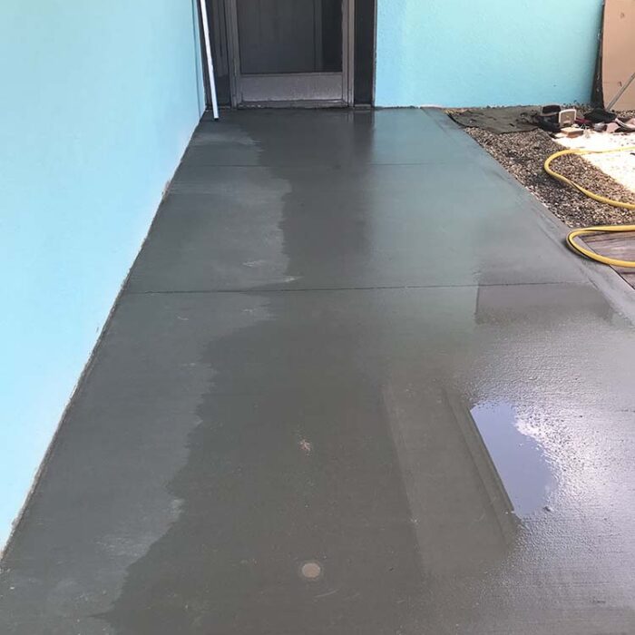 New concrete front porch expansion.